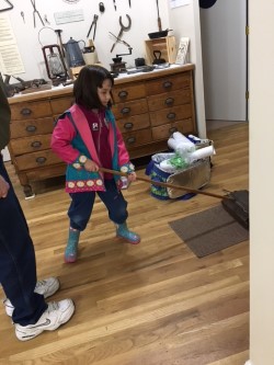 Liza and carpet sweeper.jpg