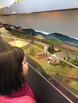Liza and tiny trains.jpg
